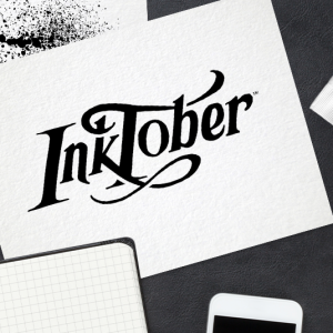 Inktober header, desk view with paper and ink